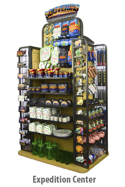 The Expedition Center wholesale double-sided floor display rack fully stocked with custom Arizona souvenirs, mugs, towels, and gifts