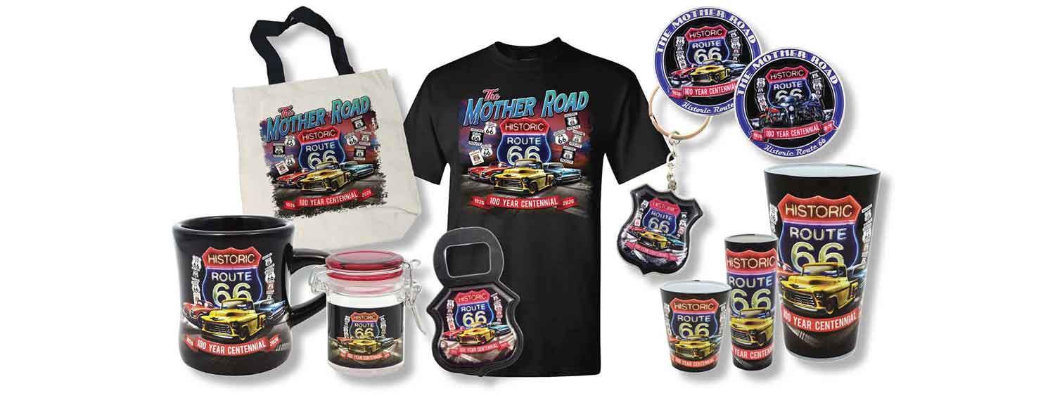 A wholesale collection of Route 66 Centennial custom souvenirs, including a black t-shirt, tote bag, mugs, bottle opener, keychain, and magnets with an illustrative vintage car design