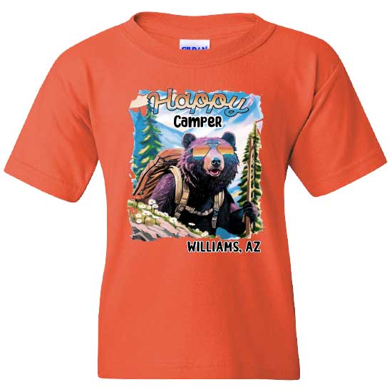 An orange souvenir t-shirt featuring a custom design of a black bear hiking with a backpack and sunglasses, with text reading Happy Camper Williams, AZ
